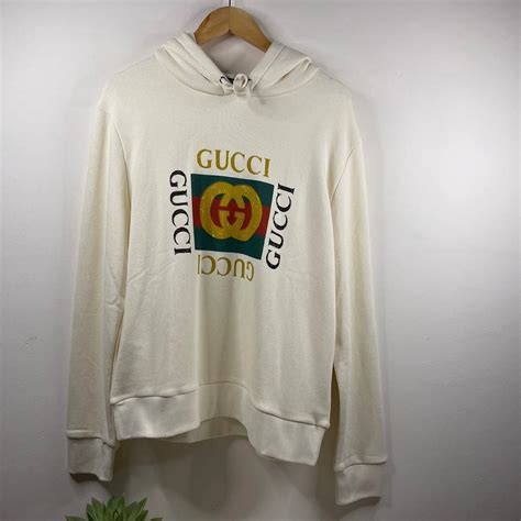 gucci logo hoodie|Gucci oversized logo hoodie.